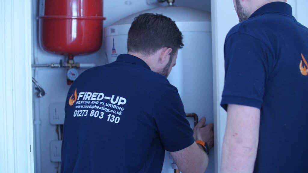 Local plumbing team outside their business